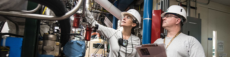 Two workers at a manufacturing plant