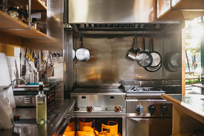Empty kitchen showing where pest might be hiding.